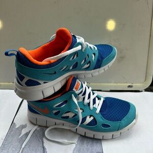 Nike free run, blue safety orange DD0163-400 New
Size 7y